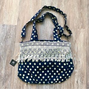 Navy and white polka dot bag